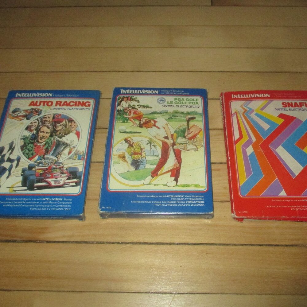 Mixed Lot of 3 Boxed Intellivision Games Auto Racing, PGA Golf and SNAFU)